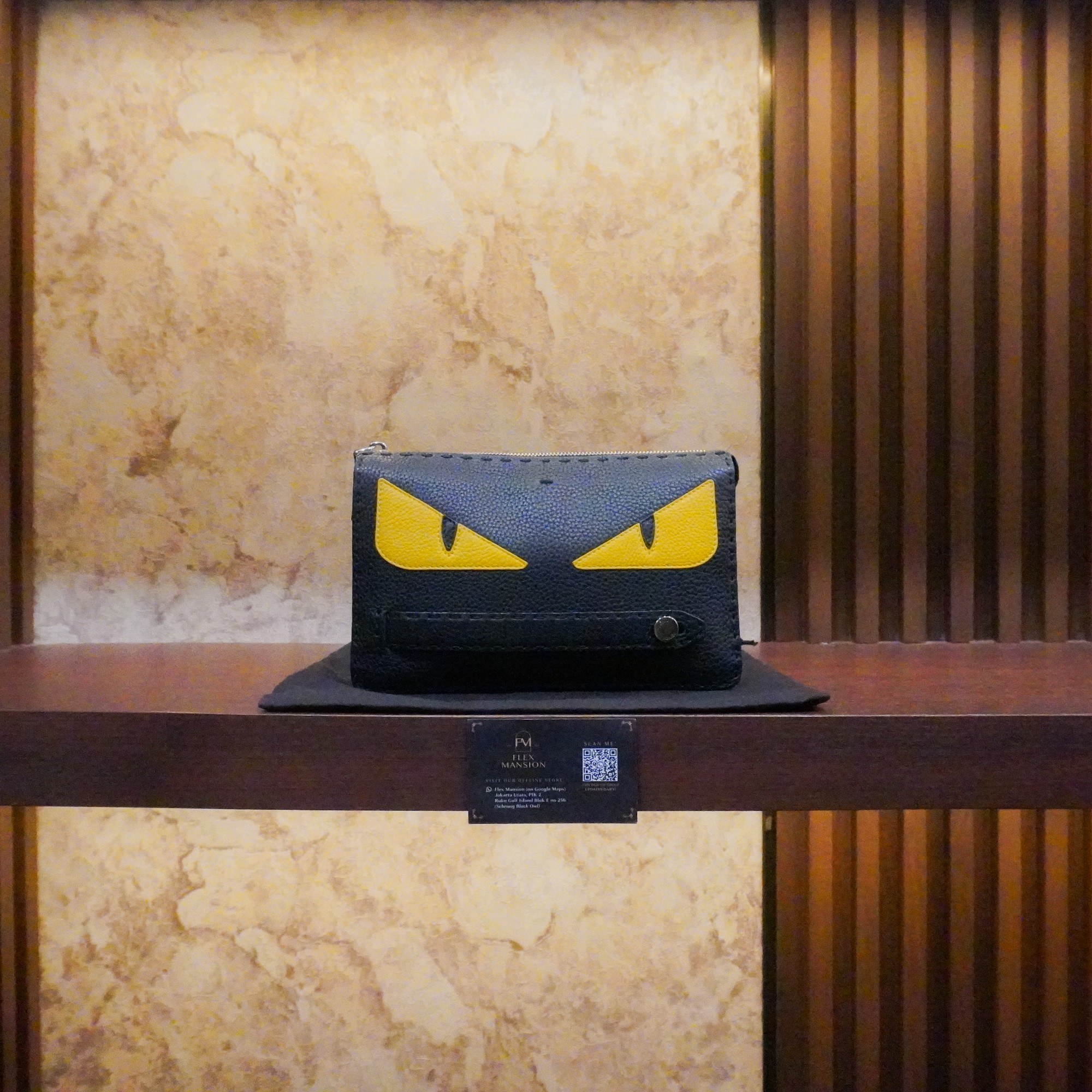 Fendi eye monster handling pouch