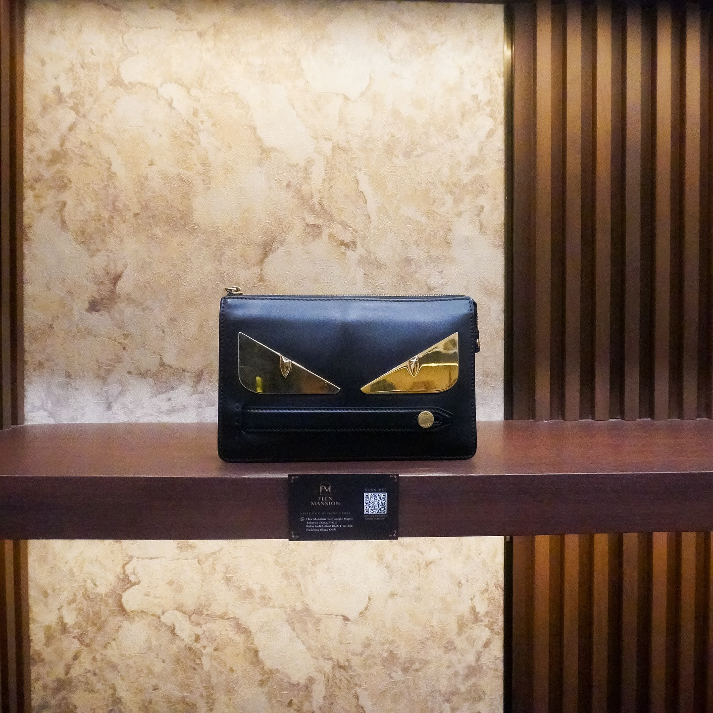Fendi eye monster handling clutch leather black gold (new 20jt